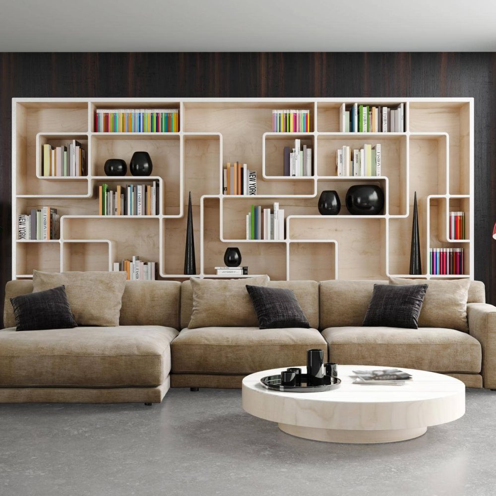 Bibliothèque design disposée derrière un canapé pour structurer l’espace avec style