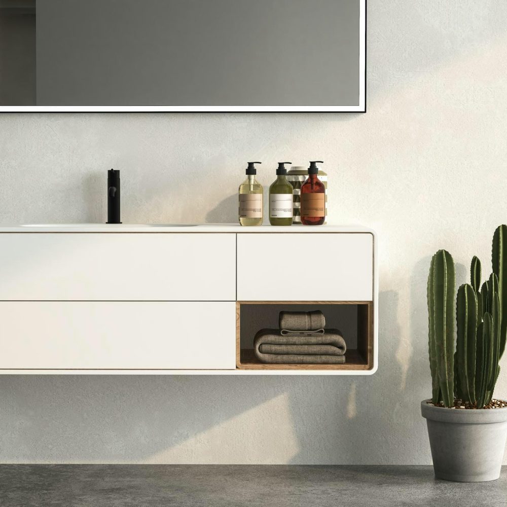 meuble de salle de bain blanc équipé de robinetterie noire pour un contraste moderne et raffiné