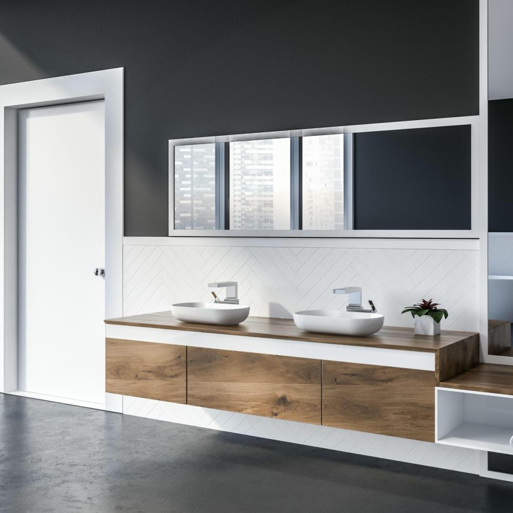 salle de bain contemporaine équipée d’un meuble avec double vasque et finitions design
